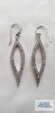 Silver colored dangle earrings, marked 925