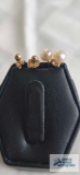 Gold colored pearl and ball earrings. Both marked 14K.