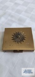 Compact coin holder
