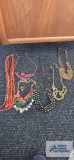 Beaded and large costume jewelry necklaces.