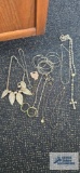 Costume jewelry necklaces, bangles, bracelets, earrings, and rosary