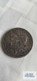 1881 Morgan one dollar coin, marked O