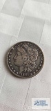 1881 Morgan dollar coin, marked O