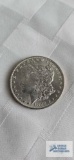 1883 Morgan one dollar coin, marked O
