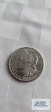 1880 Morgan one dollar coin, marked S