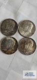 (4) 1964 Kennedy half dollar coins.