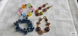 4 costume jewelry bracelets.