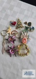Costume jewelry pins and keychain