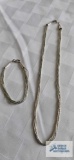 Silver colored liquid silver bracelet and necklace set, 13.9 G, marked 925 and Sterling.