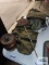 Independence wooden barrel safe, metal door needs reattached. Army bags and World War II placard.