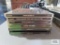 Five PlayStation games including Tomb Raider, Tomb Raider II, Tomb Raider III, Tomb Raider: The Last