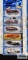 One 2000 CD Customs series Hot Wheels car, two 2000 series Tony Hawk Skate series Hot Wheels cars,