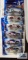 Five 2004 Hot Wheels Flag series cars and one 2003 Hot Wheels Dragon series car, new in packages