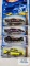 Four 2001 Skin Deep series Hot Wheel cars, new in packages. not complete