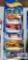 Four 2003 Work Crushers Hot Wheels cars and one Alt Terrain 2003 Hot Wheels car, new in packages
