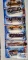 Three Classic 2004 Hot Wheels cars, three Wastelanders 2003 Hot Wheels cars, and one Dragon Wagons
