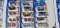 Fourteen 2004 First Editions Blings Hot Wheels cars, new in packages