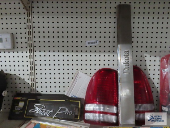 Dodge Dakota tail lights and trim piece and Street Pro chrome script
