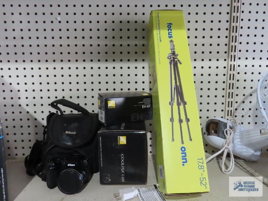 Onn 17.8" by 52" tripod with smartphone cradle new in box. Nikon Coolpix L120 camera with box, case
