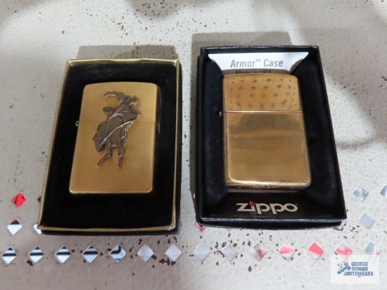 Zippo lighter in box and Zippo cowboy and horse figurine lighter in box