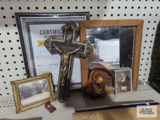Religious items, wall mirror, framed photograph, and etc
