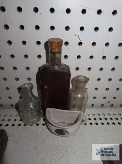 Antique bottles and comical half mug made in Japan