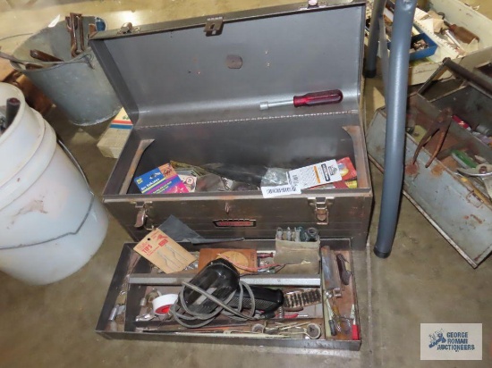 Craftsman metal toolbox with various tools, electrical items, and hardware