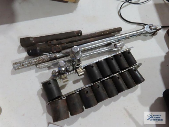 1/2" and 3/8" breaker bars, 1/2" swivel, 3/8" and 1/4" swivel with adapter, impact sockets, 1/2"