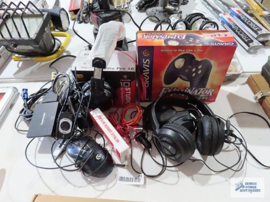 JVC headphones, Gravis Eliminator Gamepad Pro with box, Studio 10 DJ headphones, Samsung hard drive