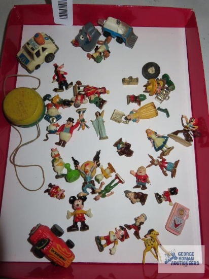 Various miniature figurines and toys