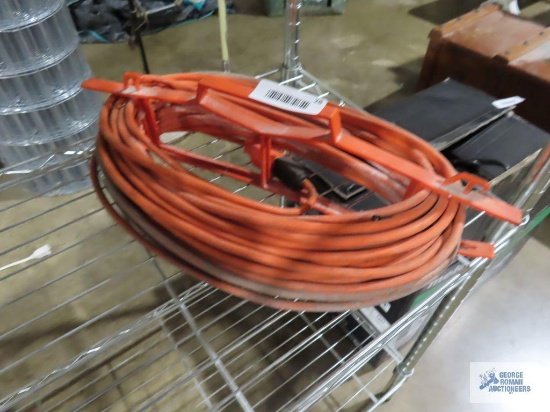Heavy duty extension cord with cord holder
