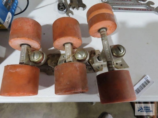 Track Force skateboard trucks and wheels. one has a groove in the wheel.