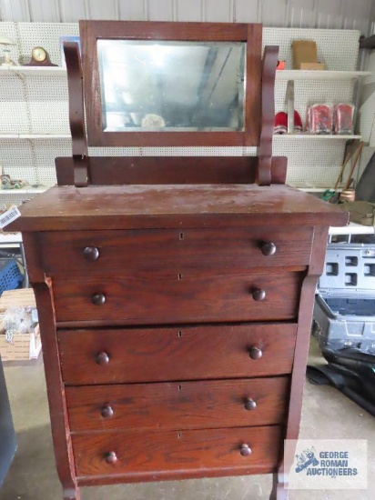 Oak chest of drawers with round dovetail drawers and mirror