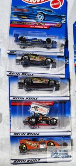 Complete set of 2000 Mad Maniax series Hot Wheel cars new in packages with one extra