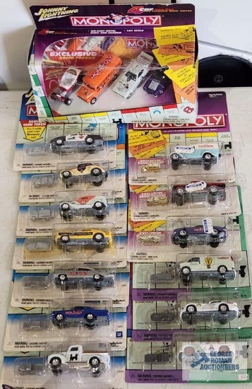 Johnny Lightning Monopoly car gift set and 13 Johnny Lightning Monopoly diecast cars, new in