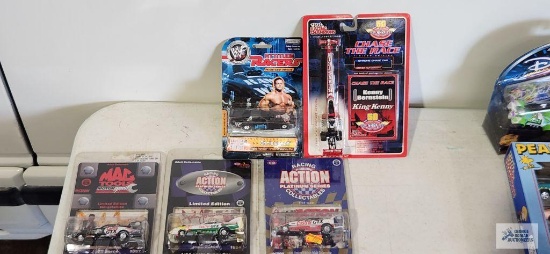 Action Racing diecast dragsters, Mac Tools dragster, WWF dragster, and King Kenny dragster, all new