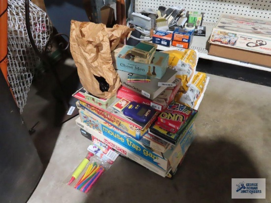 Variety of games, playing cards, balloons, and electronic slot game
