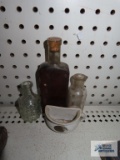 Antique bottles and comical half mug made in Japan