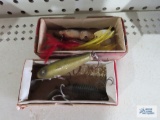 Two vintage fishing lures in boxes