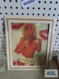 Cardboard framed photograph under glass
