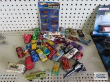 Variety of toy cars and Hot Wheel stickers
