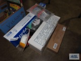 Smoke detector new in box, partial box of LED bulbs, carbon monoxide alarms, power strip and etc