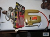 Black & Decker jigsaw. Black & Decker drill and attachments.