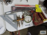 Speed square, heat shrink tubing, vintage thermometer, machinist caliper, snap ring pliers, etc