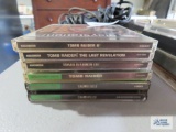 Five PlayStation games including Tomb Raider, Tomb Raider II, Tomb Raider III, Tomb Raider: The Last