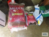 Five bags of red mulch. two cubic feet per bag