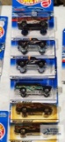 Complete set of 2000 Action Pack series Hot Wheel cars new in packages with extras