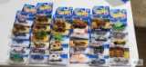 32 of the 2000 Virtual Collection series Hot Wheels cars, new in packages.