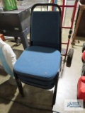 Three commercial stacking padded chairs