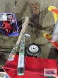 Tomato cages and weed barrier, bamboo skewers, handsaw
